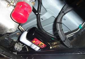 Why throw money at the quick lubes? AMSOIL Bypass kits keep Omaha vehicles from having to change oil.