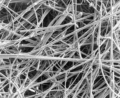A nanofiber is less than one micron in diameter. A human hair is 80 microns.