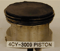 Ring condition absolutely clean (10 merit rating). Piston skitrts 9.7 and 9.6 (anti-thrust and thrust sides). Piston under crown and cylinder wall = 7.